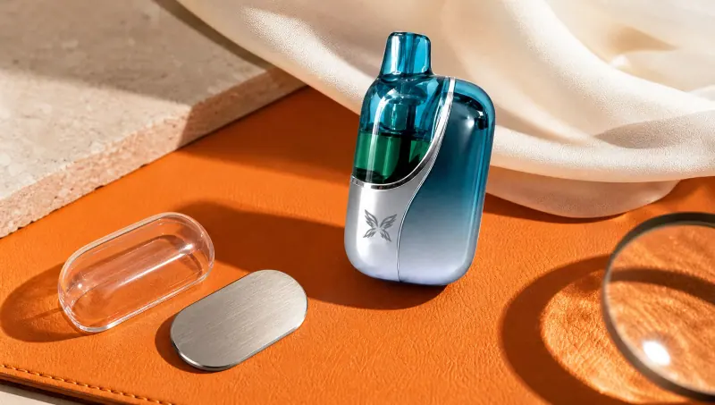 WINDBAR CHROMA WING in Ice Cyan with clear cap and metal plate on orange leather (WindBar.ai)