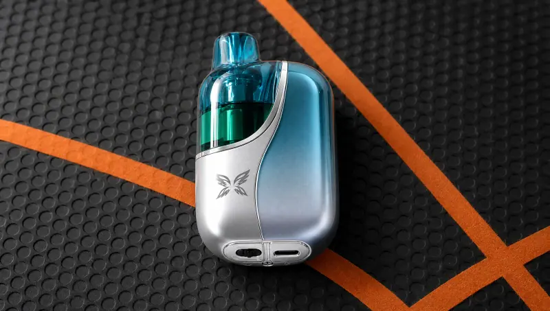 WINDBAR CHROMA WING in Ice Cyan lying on black hexagon mesh with orange lines (WindBar.ai)