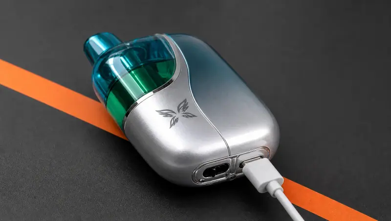 WINDBAR CHROMA WING in Ice Cyan connected to a white USB-C cable (WindBar.ai)
