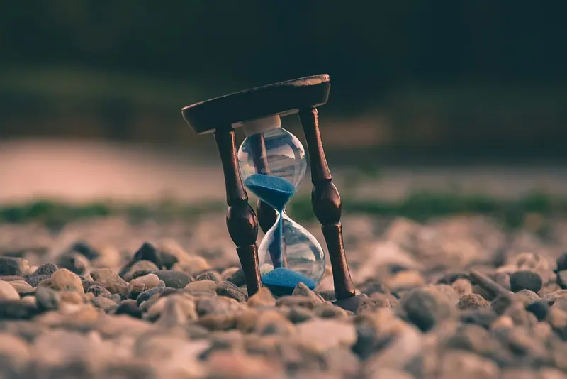 Analog clock close-up (Unsplash stock) — WindBar.ai D91 Voyagers