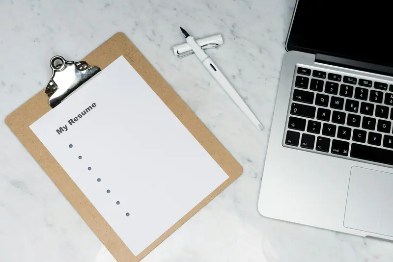 Business cards on desk (Unsplash stock) — WindBar.ai D91 Voyagers