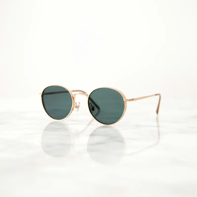 Sunglasses on a surface (Unsplash stock) — WindBar.ai D91 Voyagers