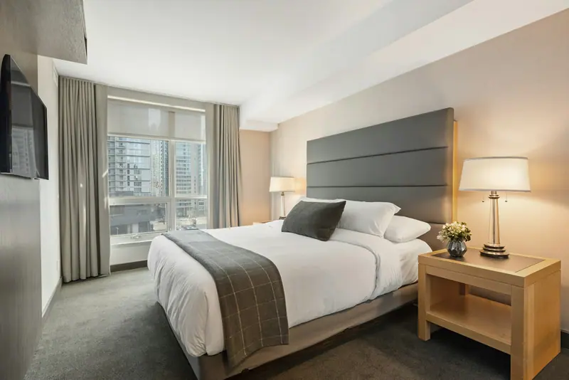 Modern hotel bedroom interior (Unsplash stock) — WindBar.ai D91 Voyagers