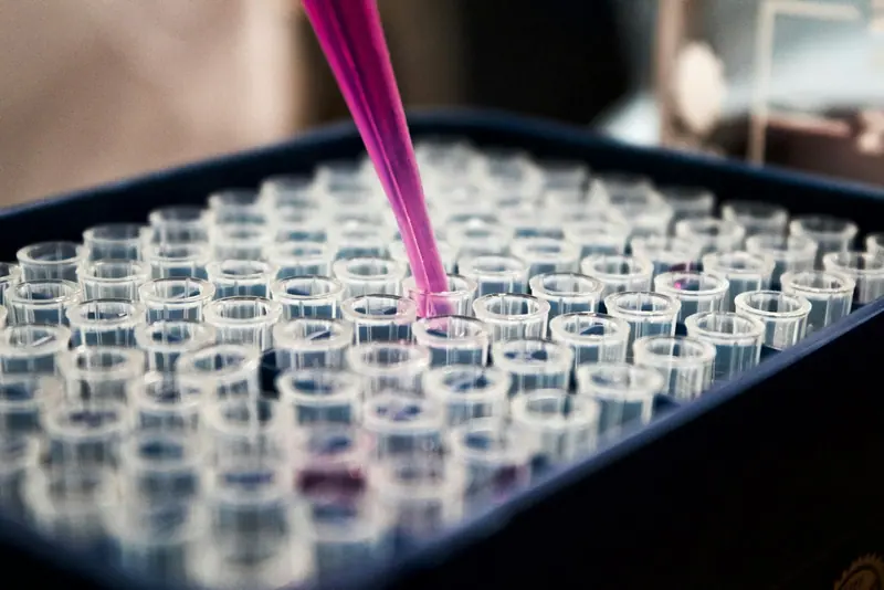 Laboratory glassware on bench (Unsplash stock) — WindBar.ai D91 Voyagers