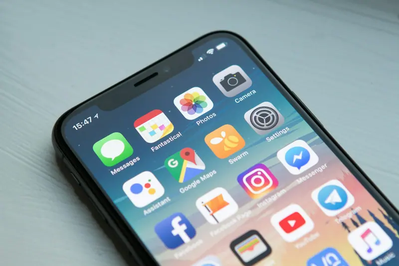 Smartphone in hand (Unsplash stock) — WindBar.ai D91 Voyagers