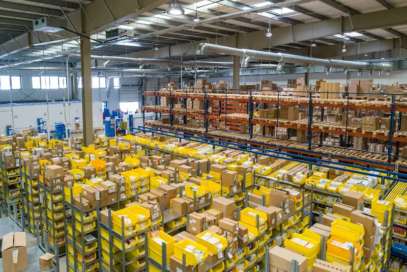 Stacked shipping crates in warehouse (Unsplash stock) — WindBar.ai D91 Voyagers