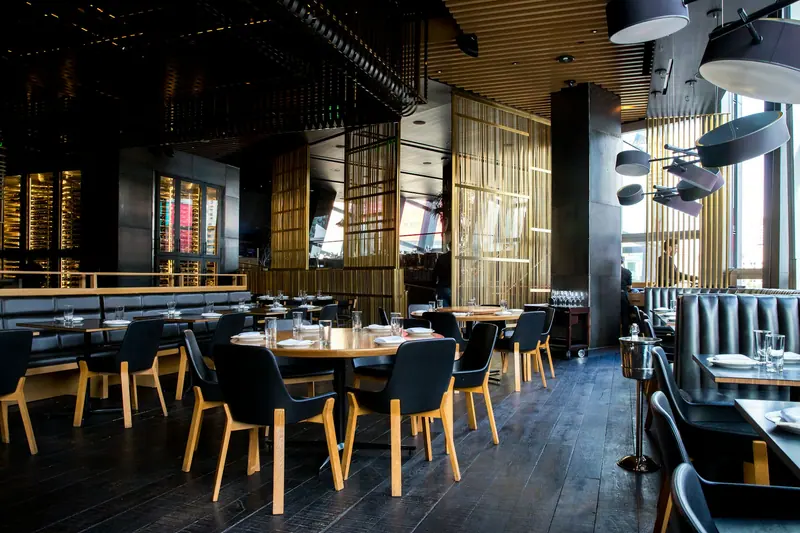Restaurant cafe interior tables (Unsplash stock) — WindBar.ai D91 Voyagers