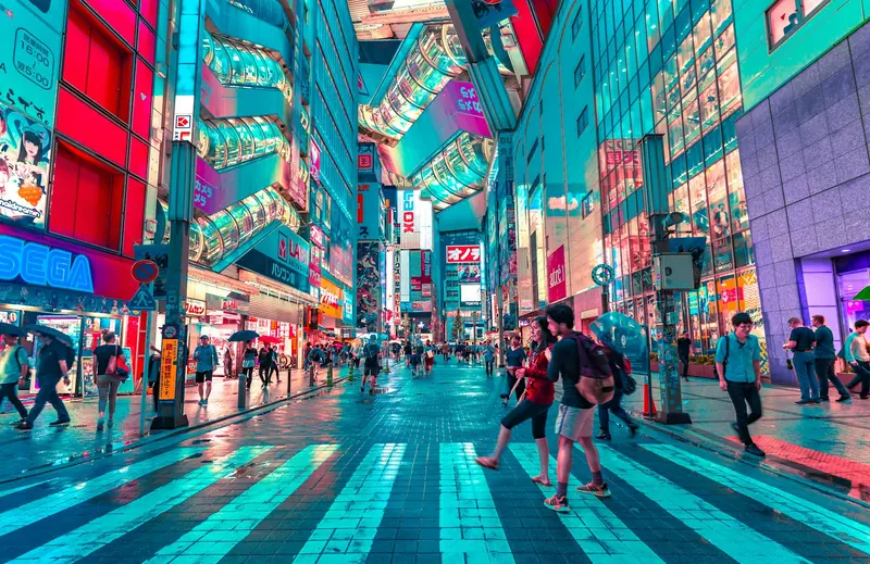 Tokyo Shibuya crossing at night (Unsplash stock) — WindBar.ai D91 Voyagers