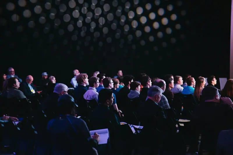 Conference trade show hall (Unsplash stock) — WindBar.ai D91 Voyagers