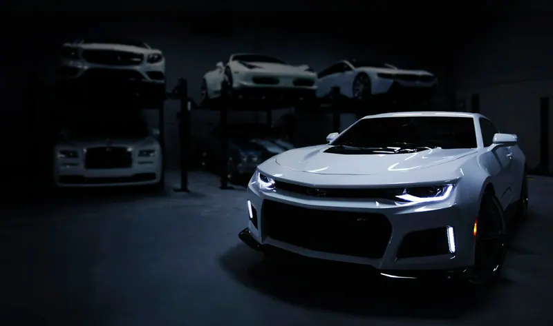 Sports car front at night (Unsplash stock) — WindBar.ai D91 Voyagers