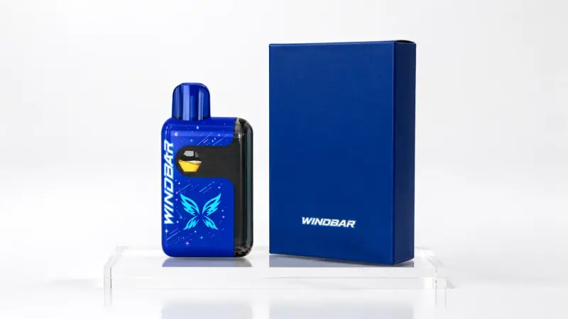 WINDBAR SPECTRUM in Cobalt Blue beside its navy retail box on white